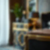 Elegant black and gold nightstand featuring intricate design