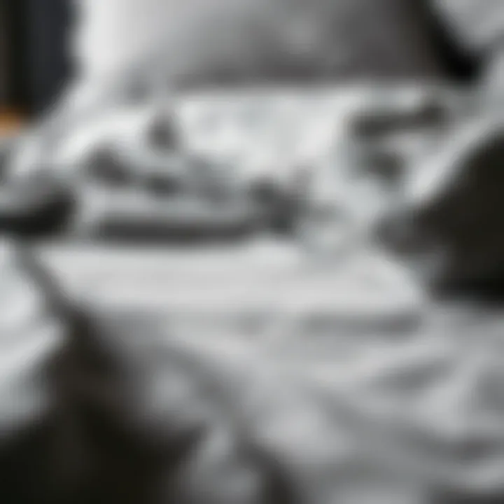 Close-up of luxurious fabric textures in a grey bedspread