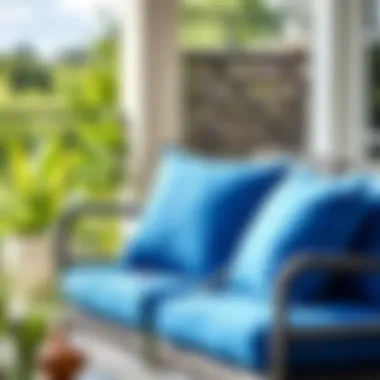 Vibrant blue outdoor cushions arranged on a patio chair