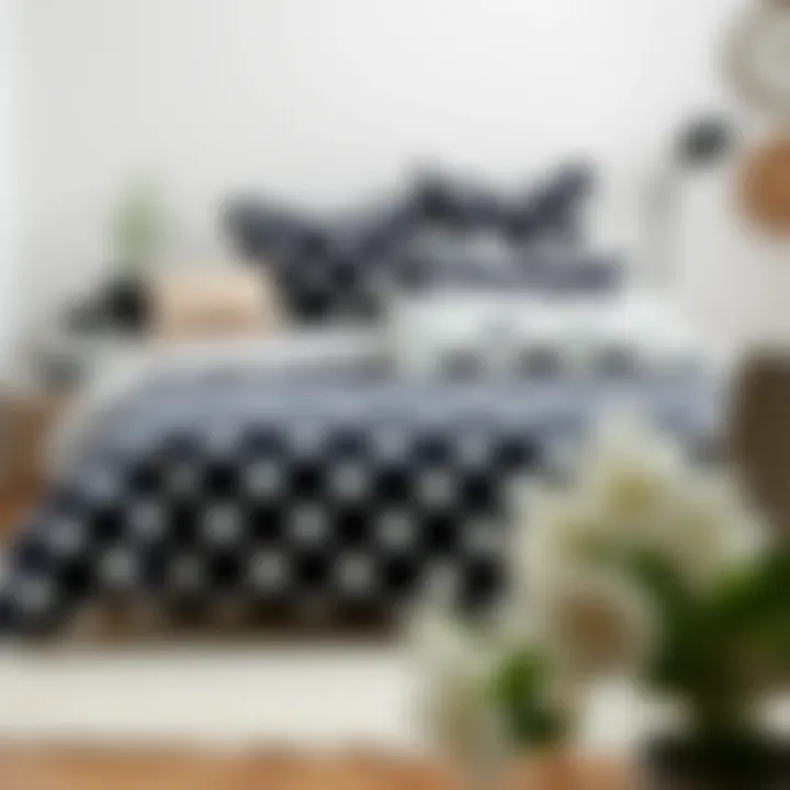 Minimalist Decor with Polka Dot Bedding Stylish arrangement of black and white polka dot comforter in a minimalist decor setting