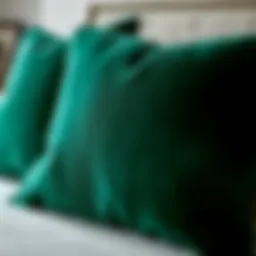 A luxurious velvet throw pillow cover in deep emerald green