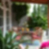 Stylish small patio dining setup with elegant furniture.