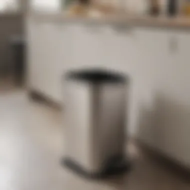 Sleek and modern pedal trash can in a contemporary kitchen setting.