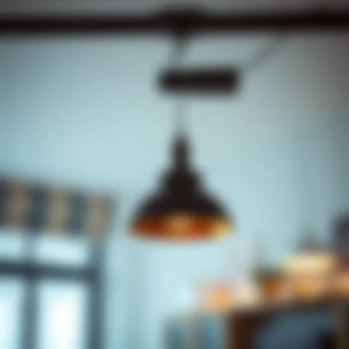 A stylish pendant light attached to a track system showcasing design versatility