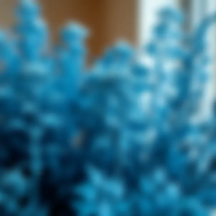 Close-up of blue fake plants highlighting the details in their design, emphasizing the craftsmanship and material quality.