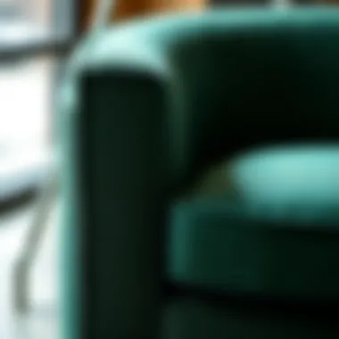 Close-up of luxurious fabric texture of an emerald green lounge chair