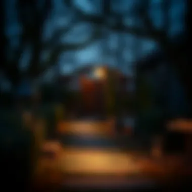 Elegant battery patio lantern illuminating a garden pathway at dusk